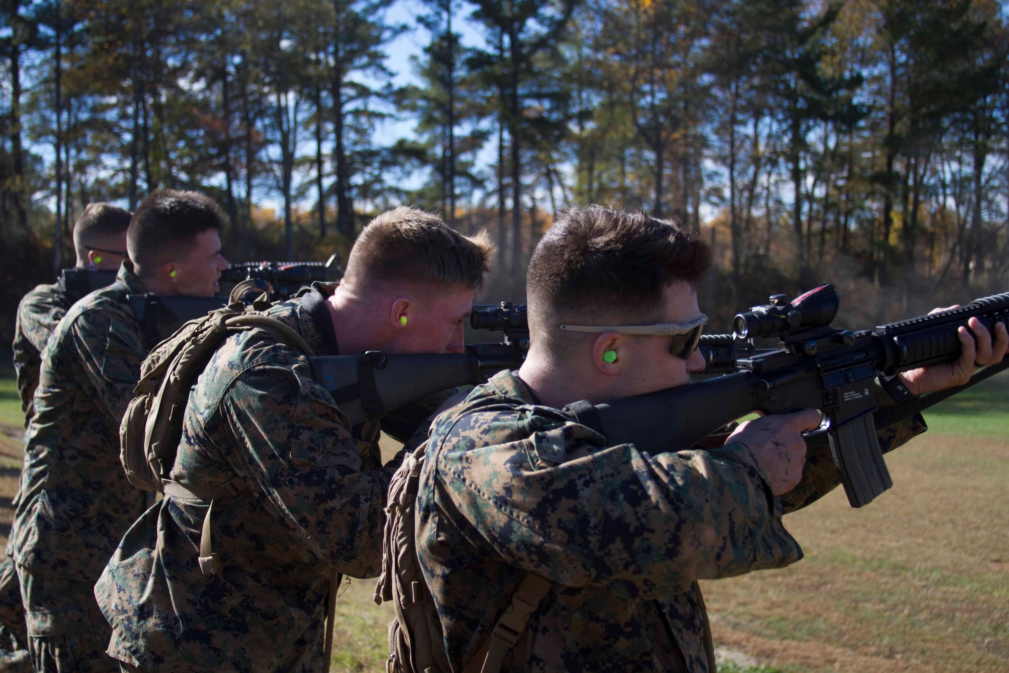 Marines shoot in four-man teams during the 3rd annual Montford Point Biathlon at Camp Barrett, Quantico, Va., Oct. 30, 2015. The competitors in this year’s biathlon ran from The Basic School to Range Three, where they fired from the 200 yard-line in the prone and standing positions with 20 rounds of ammunition, then ran back to TBS. The event commemorates Montford Point Marines, African Americans recruited into the Marine Corps from 1942 through 1949. At that time African Americans did not attend boot camp at Marine Corps Recruit Depot Parris Island, S.C., or MCRD San Diego, Calif. Instead, African American Marines were segregated, experiencing basic training at Montford Point in Camp Lejeune, N.C. Approximately 20,000 Marines went through basic training at Montford Point. (Official USMC photo by Pfc. Sheamus Sawyer)