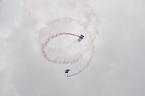 The U.S. Air Force Wings of Blue perform during the 2015 Joint Base San Antonio Air Show and Open House Nov. 1, 2015 at JBSA-Randolph, Texas. Air shows allow the Air Force to display the capabilities of our aircraft to the American taxpayer through aerial demonstrations and static displays and allowing attendees to get up close and personal to see some of the equipment and aircraft used by the U.S. military today. (U.S. Air Force photo by Olivia Mendoza) 