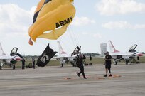 A member of the U.S. Army Golden Knights lands during the 2015 Air Show and Open House Nov. 1, 2015 at Joint Base San Antonio-Randolph, Texas. Air shows allow the Air Force to display the capabilities of our aircraft to the American taxpayer through aerial demonstrations and static displays and allowing attendees to get up close and personal to see some of the equipment and aircraft used by the U.S. military today. (U.S. Air Force photo by Olivia Mendoza) 