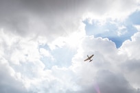 A P-51 Mustang flies over the Joint Base San Antonio Air Show and Open House Nov. 1, 2015, at JBSA-Randolph. JBSA  air show allowed attendees to get up close and personal to see some of the equipment and aircraft used by the past and present U.S. military.
