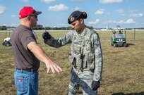 Airman 1st Class Aysha Ramirez, 502d Security Forces Squadron, uses a handheld metal detector to search visitors during the 2015 Joint Base San Antonio Air Show and Open House Nov. 1, 2015 at JBSA-Randolph, Texas. Air shows allow the Air Force to display the capabilities of our aircraft to the American taxpayer through aerial demonstrations and static displays. JBSA-Randolph’s air show allowed attendees to get up close and personal to see some of the equipment and aircraft used by the U.S. military today. (U.S. Air Force photo by Joshua Rodriguez/Released)