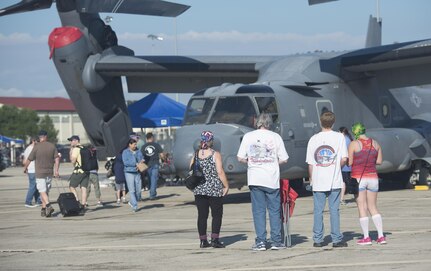 San Antonio residents view a CV-22 Osprey that was on display at the 2015 Joint Base San Antonio Air Show and Open House Nov. 1, 2015 at JBSA-Randolph, Texas.  Air shows allow the Air Force to display the capabilities of our aircraft to the American taxpayer through aerial demonstrations and static displays. JBSA-Randolph’s air show allowed attendees to get up close and personal to see some of the equipment and aircraft used by the U.S. military today. (U.S. Air Force photo by Senior Airman Krystal Wright/Released)