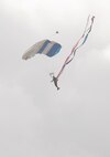 A member of the U.S. Air Force Wings of Blue performs during the 2015 Joint Base San Antonio Air Show and Open House Nov. 1, 2015, at JBSA-Randolph, Texas.  Air shows allow the Air Force to display the capabilities of our aircraft to the American taxpayer through aerial demonstrations and static displays. JBSA-Randolph’s air show allowed attendees to get up close and personal to see some of the equipment and aircraft used by the U.S. military today.  (U.S. Air Force photo by Senior Airman Krystal Wright/Released)