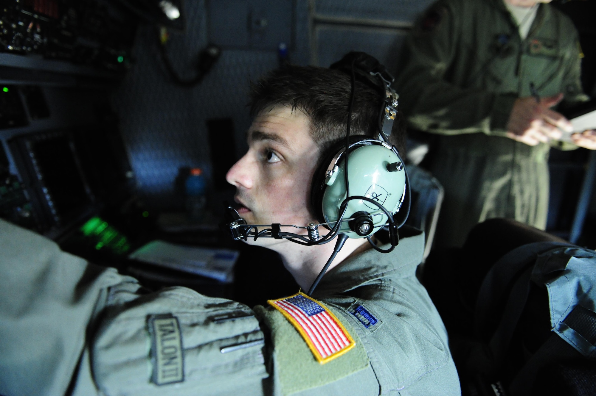 U.S. Air Force Capt. Thomas Sanders, 353rd Special Operations Support Squadron instructor navigator, prepares equipment before taking off aboard a MC-130H Combat Talon II Sept. 10, 2015 at Kadena Air Base, Japan. Sanders received the Airlift/Tanker Association Young Leadership Award during an award banquet held Oct. 29 in Orlando, Fla. (U.S. Air Force photo by Airman 1st Class Corey M. Pettis)