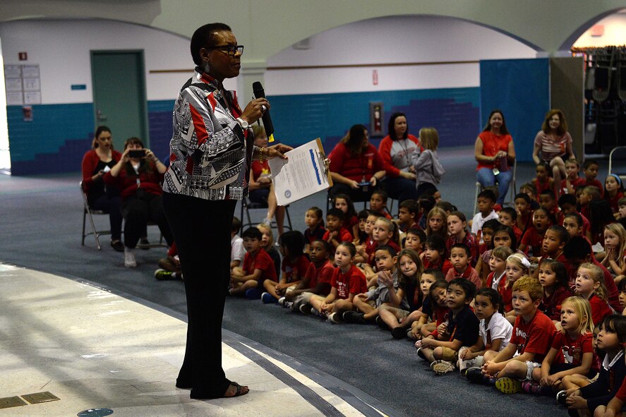 Willette Horne-Barnes, Andersen Elementary School principal, speaks to students about the importance of drug abuse prevention during a Red Ribbon Week presentation Oct. 28, 2015, at Andersen Air Force Base, Guam. The 2015 Red Ribbon Week campaign’s slogan was “respect yourself, be drug free.” (U.S. Air Force photo by Airman 1st Class Alexa Ann Henderson/Released)