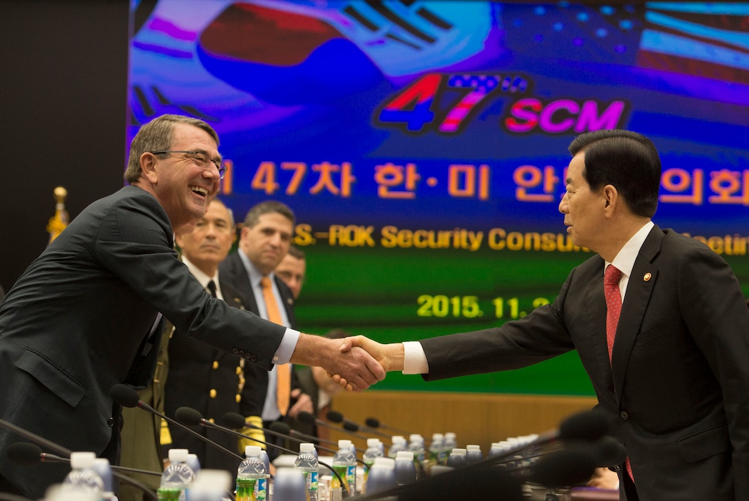 U.S. Defense Secretary Ash Carter shakes hands with South Korean Defense Minister Han Min-koo as they arrive for the 47th U.S.-South Korea Security Consultative Meeting plenary session in Seoul, South Korea, Nov. 2, 2015. DoD photo by Air Force Senior Master Sgt. Adrian Cadiz