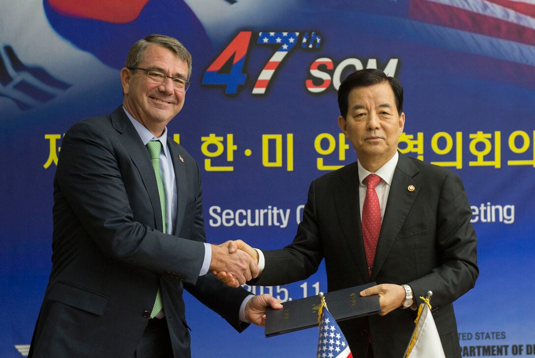 U.S. Defense Secretary Ash Carter shakes hands with South Korean Defense Minister Han Min-koo at the conclusion of the 47th U.S.-South Korea Security Consultative Meeting plenary session in Seoul, South Korea, Nov. 2, 2015. DoD photo by Air Force Senior Master Sgt. Adrian Cadiz