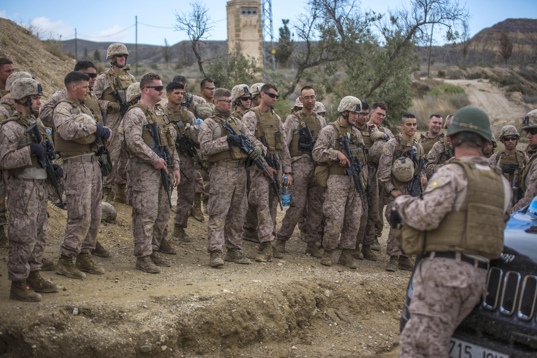 U.S. Marines receive a safety brief before they conduct live-fire drills during Trident Juncture 2015 in Almeria, Spain, Oct. 27, 2015. The Marines are assigned to the 4th Light Armored Reconnaissance Battalion, 4th Marine Division. U.S. Marine Corps photo by Cpl. Gabrielle Quire