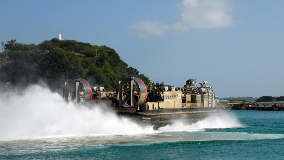Landing Craft Air Cushion 21 assigned to Naval Beach Unit 7 departs Naval Facility White Beach en route to the amphibious dock landing ship USS Germantown (LSD 42), Oct. 27, 2015 in Okinawa, Japan. Germantown with embarked Marines from 3rd Marine Division, 1st Marine Aircraft Wing and 3rd Marine Logistics Group will participate in exercise Blue Chromite. Blue Chromite is an amphibious training exercise conducted with the 4th Marine Regiment, Marine Air Group 36, Combat Logistics Regiment 4, and other elements of III Marine Expeditionary Force. Germantown is on patrol in the U.S. 7th Fleet area of operation in support of security and stability in the Indo-Asia-Pacific region.