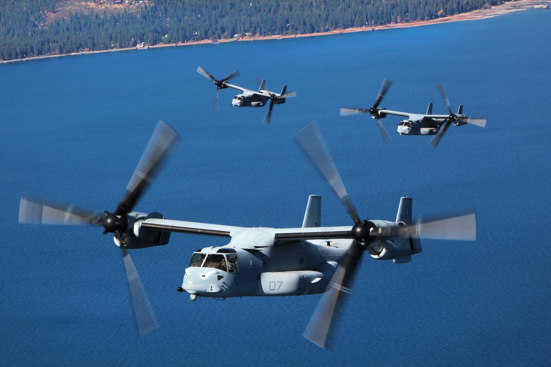 Marine Corps MV-22B Osprey aircraft fly over Lake Tahoe during Mountain Exercise 6-15 in South Lake Tahoe, Calif., Oct. 29, 2015. The Osprey crews are assigned to Marine Medium Tiltrotor Squadron 163, Marine Aircraft Group 16, 3rd Marine Aircraft Wing. The exercise is to develop the squadron’s expeditionary proficiency in a dynamic high altitude, cold weather training environment. U.S. Marine Corps photo by Cpl. Allison J. Herman