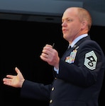Chief Master Sergeant Christopher Muncy, command chief master sergeant of the Air National Guard, addresses 1,000 Guard Airmen at the Enlisted Leadership Symposium in Nashville, Tenn.