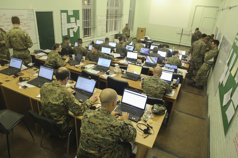 U.S. Marines with 2nd Intelligence Battalion and British soldiers work to gather mock intelligence during Exercise Phoenix Odyssey II in Edinburgh, U.K., Oct. 28, 2015. The British and U.S. are collaborating for the second consecutive year in order to enhance joint intelligence operations. (U.S. Marine Corps photo by Cpl. Lucas Hopkins/Released)