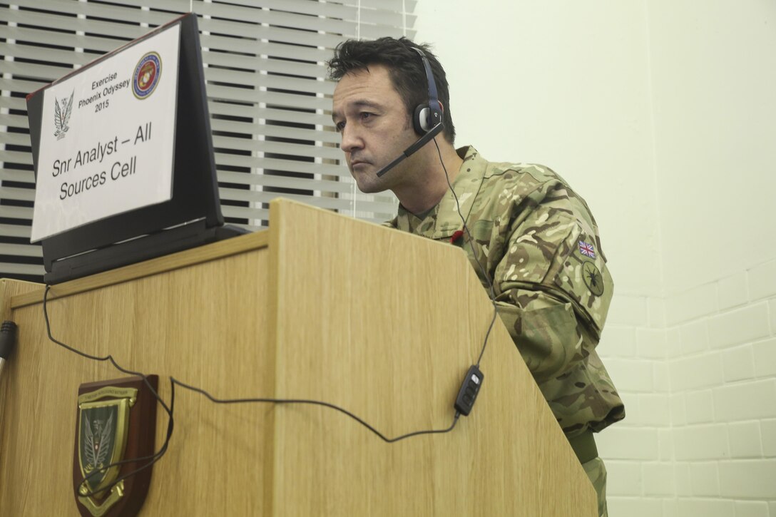 A British soldier prepares a brief during Exercise Phoenix Odyssey II in Edinburgh, U.K., Oct. 28, 2015. The British are partnering with the U.S. Marines for the two-week intelligence exercise in order to bolster joint intelligence capabilities. (U.S. Marine Corps photo by Cpl. Lucas Hopkins/Released)