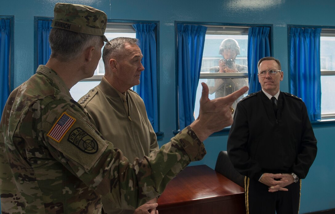 Marine Corps Gen. Joseph F. Dunford Jr., 19th Chairman of the Joint Chiefs of Staff, is briefed by U.S. Army Col. James Minnich, secretary of the United Nations Command Military Armistice Commission, during his visit to the Demilitarized Zone in the Republic of Korea, Nov. 2, 2015 DoD photo by Navy Petty Officer 2nd Class Dominique A. Pineiro