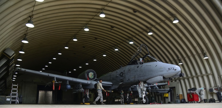 Airmen from the 25th Aircraft Maintenance Unit load munitions onto an A-10 Thunderbolt II during the Vigilant Ace 16 exercise on Osan Air Base, Republic of Korea, Nov. 1, 2015. Exercises such as this help test team Osan's ability to survive and operate in wartime constraints. The weapons Airmen from the 25th AMU are responsible for 10 varieties of conventional munitions that can be loaded onto the A-10 frame. (U.S. Air Force photo/Senior Airman Kristin High)