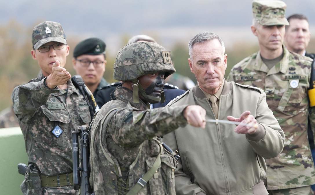 U.S. Marine Corps Gen. Joseph F. Dunford Jr., chairman of the Joint Chiefs of Staff, listens to a South Korean soldier brief him during a trip to the Demilitarized Zone in South Korea, Nov. 2, 2015 DoD photo by U.S. Navy Petty Officer 2nd Class Dominique A. Pineiro