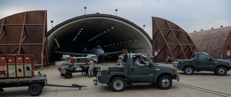 Weapons load crew team Airmen from the 25th Aircraft Maintenance Unit prepare to load munitions onto A-10 Thunderbolt IIs during the Vigilant Ace 16 exercise on Osan Air Base, Republic of Korea, Nov. 1, 2015. The munitions Airmen can load up to 16,000 pounds of mixed ordnance onto the A-10 airframe. The A-10 is powered by two General Electric TF34-GE-100 turbofan engines producing 9,065 pounds of thrust each, and the A-10 is capable  of reaching speeds of 450 nautical miles per hour. (U.S. Air Force photo/Senior Airman Kristin High)