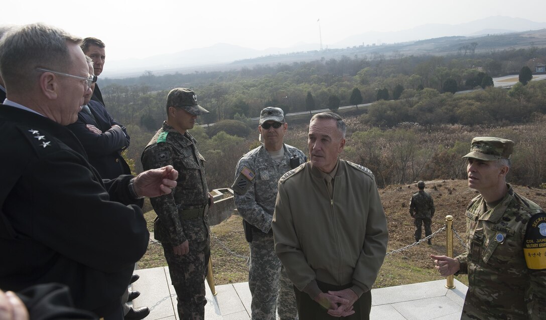 U.S. Marine Corps Gen. Joseph F. Dunford Jr., chairman of the Joint Chiefs of Staff, receives a briefing from U.S. Army Lt. Gen. Bernie Champoux, commanding general 8th U.S. Army, and chief of staff for the U.N. command in South Korea, and U.S. Army Col. James Minnich, secretary of the U.N. Command Military Armistice Commission, during his visit to the Demilitarized Zone in South Korea, Nov. 2, 2015. DoD photo by U.S. Navy Petty Officer 2nd Class Dominique A. Pineiro