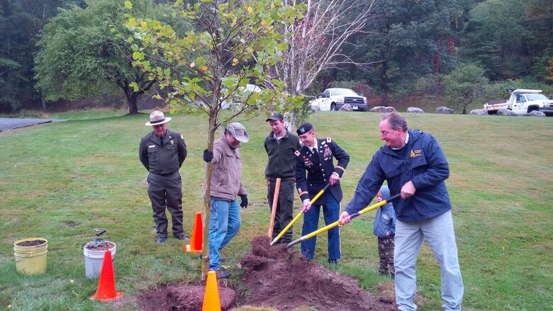 A ceremonial tree planting took place immediately after the speeches during the Northfield Brook 50th Anniversary Celebration, October 3, 2015.