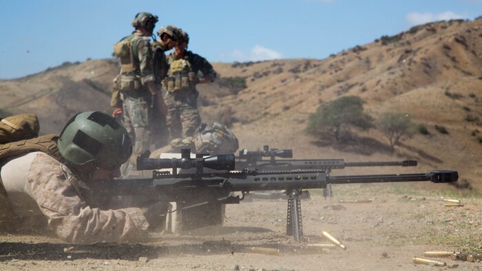 A Marine with 1st Marine Raider Battalion fires a .50 caliber Special Application Scoped Rifle during a Company Collective Exercise aboard Marine Corps Base Camp Pendleton, Calif., Oct. 7, 2015. Marine Special Operations Company C, 1st Marine Raider Battalion, U.S. Marine Corps Forces, Special Operations Command spent the first phase of their three-phase Company Collective Exercise practicing Foreign Internal Defense aboard Marine Corps Base Camp Pendleton, Calif., Oct. 5-8.