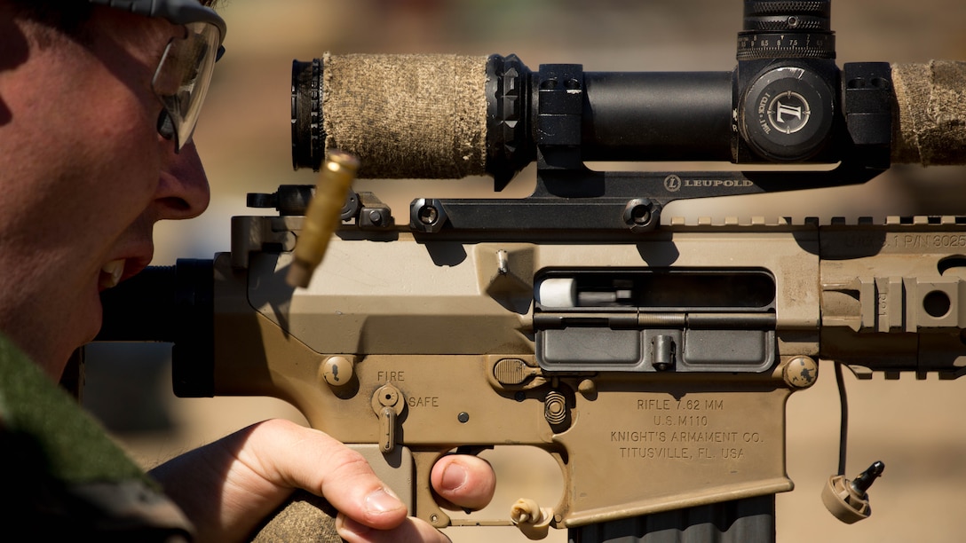 A Marine with Company C, 1st Marine Raider Battalion, U.S. Marine Corps Forces, Special Operations Command fires at distant, static targets during a Company Collective Exercise aboard Marine Corps Base Camp Pendleton, Calif., Oct. 7, 2015. Marine Special Operations Company C spent the first phase of their three-phase Company Collective Exercise practicing Foreign Internal Defense aboard Marine Corps Base Camp Pendleton, Calif., Oct. 5-8.