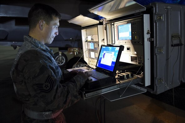 Tech. Sgt. Matthew Hoover, a Combat Shield crew leader assigned to the 16th Electronic Warfare Squadron, Eglin Air Force Base, Florida, monitors a USM-642 Raven signal generator during Combat Shield, Oct. 20, 2015, at Seymour Johnson Air Force Base, North Carolina. Hoover used the USM-642 to simulate real-world radar emissions and test the sensitivity of the threat detection systems of an F-15E Strike Eagle. (U.S. Air Force photo/Senior Airman Aaron J. Jenne) 