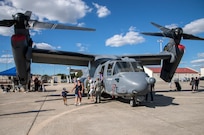 Residents of the San Antonio community board a CV-22 Osprey during the 2015 Joint Base San Antonio Air Show and Open House Oct. 31, 2015 at JBSA-Randolph, Texas. Air shows allow the Air Force to display the capabilities of our aircraft to the American taxpayer through aerial demonstrations and static displays and allowing attendees to get up close and personal to see some of the equipment and aircraft used by the U.S. military today. (U.S. Air Force photo by Johnny Saldivar) 

