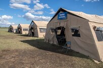 Residents of the San Antonio community were able to explore a Expeditionary City exhibit during the 2015 Joint Base San Antonio Air Show and Open House Oct. 31, 2015 at JBSA-Randolph, Texas. Air shows allow the Air Force to display the capabilities of our aircraft to the American taxpayer through aerial demonstrations and static displays and allowing attendees to get up close and personal to see some of the equipment, aircraft and a mockup of a forward operating base used by the U.S. military today. (U.S. Air Force photo by Johnny Saldivar) 
