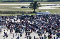 Visitors get a close up view of various aircraft during the 2015 Joint Base San Antonio Air Show and Open House Nov. 1, 2015 at JBSA-Randolph, Texas. Air shows allow the Air Force to display the capabilities of our aircraft to the American taxpayer through aerial demonstrations and static displays and allowing attendees to get up close and personal to see some of the equipment and aircraft used by the U.S. military today. (U.S. Air Force photo by Johnny Saldivar) 

