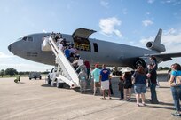 Visitors board a KC-10 Extender during the 2015 Joint Base San Antonio Air Show and Open House Oct. 31, 2015 at JBSA-Randolph, Texas. Air shows allow the Air Force to display the capabilities of our aircraft to the American taxpayer through aerial demonstrations and static displays and allowing attendees to get up close and personal to see some of the equipment and aircraft used by the U.S. military today. (U.S. Air Force photo by Johnny Saldivar) 
