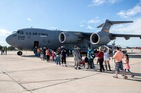Visitors board a C-17 Globemaster III during the 2015 Joint Base San Antonio Air Show and Open House Oct. 31, 2015 at JBSA-Randolph, Texas. Air shows allow the Air Force to display the capabilities of our aircraft to the American taxpayer through aerial demonstrations and static displays and allowing attendees to get up close and personal to see some of the equipment and aircraft used by the U.S. military today. (U.S. Air Force photo by Johnny Saldivar) 
