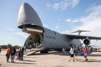 Visitors board a C-5 Galaxy during the 2015 Joint Base San Antonio Air Show and Open House Oct. 31, 2015 at JBSA-Randolph, Texas. Air shows allow the Air Force to display the capabilities of our aircraft to the American taxpayer through aerial demonstrations and static displays and allowing attendees to get up close and personal to see some of the equipment and aircraft used by the U.S. military today. (U.S. Air Force photo by Johnny Saldivar) 
