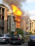 An apartment building burns during a fire in which two Indiana members helped save the lives of more than 20 people in September 2011. Army Spc. Michael Conley and Spc. Caleb Goldsberry of the 384th Military Police Company acted quickly and attribute their quick responses to their National Guard training.