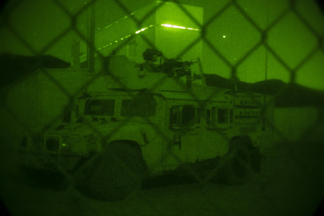 A Marine with Company C, 1st Marine Raider Battalion, U.S. Marine Corps Forces, Special Operations Command provides security during a ground mobility night raid aboard Marine Corps Base Camp Pendleton, Calif., Oct. 8, 2015. Marine Special Operations Company C spent the first phase of their three-phase Company Collective Exercise practicing Foreign Internal Defense aboard Marine Corps Base Camp Pendleton, Calif., Oct. 5-8.