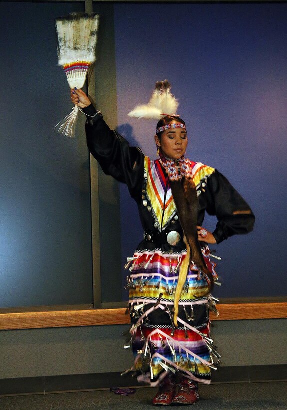 Brionna Badoni, with the Owasso Indian Education Dance Group, does a jingle dance at the Tulsa District U.S. Army Corps of Engineers during a ceremony held Nov. 2, 2015 at the Tulsa District office.  The Tulsa District held the ceremony in recognition of National American Indian Heritage Month which is celebrated throughout the month of November 2015. 