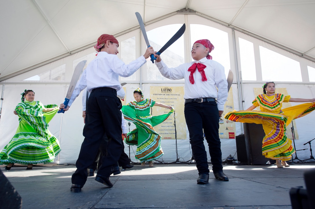 Children perform a traditional machete dance during the annual Latino Heritage Festival in Des Moines, Iowa, Sept. 27, 2015. DoD photo by EJ Hersom