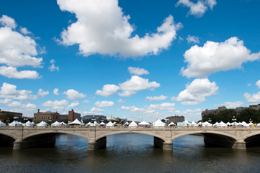Exhibit and vendor booths line a bridge crossing the Des Moines River during the annual Latino Heritage Festival in Des Moines, Iowa, Sept. 27, 2015. DoD photo by EJ Hersom