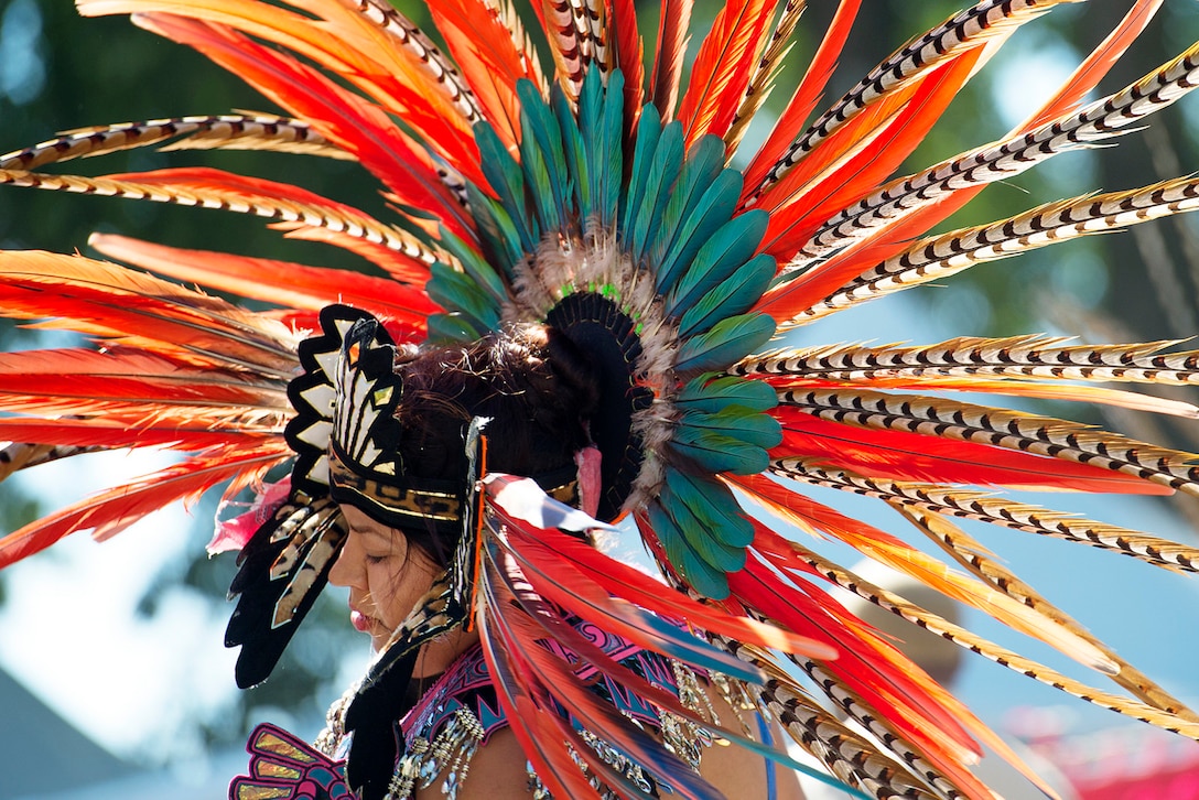 An Aztec heritage dancer wears traditional regalia for a performance during the annual Latino Heritage Festival in Des Moines, Iowa, Sept. 26, 2015. DoD photo by EJ Hersom