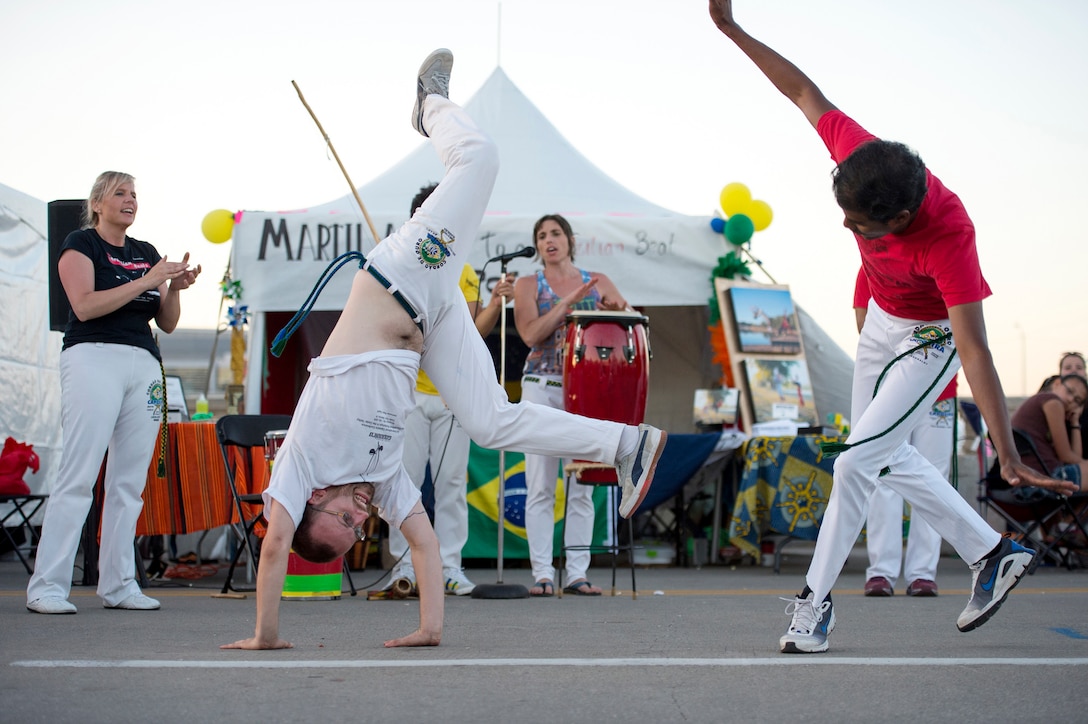 Martial arts practitioners give a capoeira demonstration during the annual Latino Heritage Festival in Des Moines, Iowa, Sept. 26, 2015. DoD photo by EJ Hersom