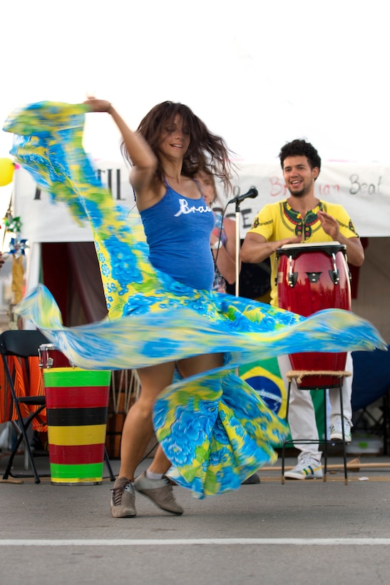 Patricia O’Connell performs a Brazilian dance during the annual Latino Heritage Festival in Des Moines, Iowa, Sept. 26, 2015. DoD photo by EJ Hersom