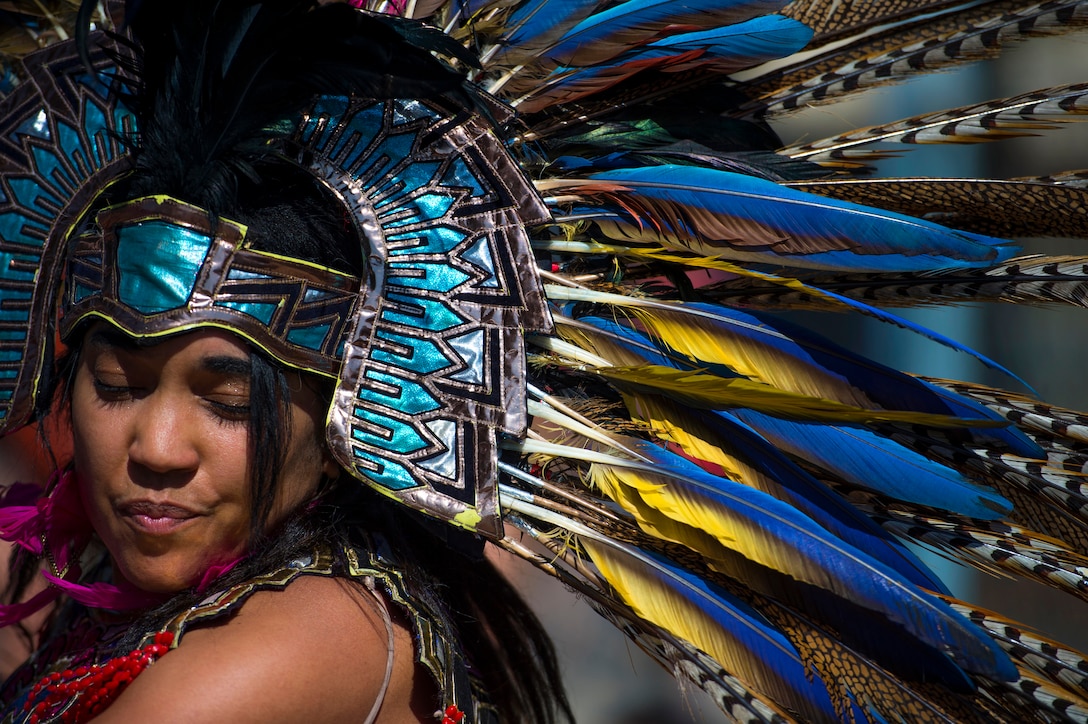 An Aztec heritage dancer wears traditional regalia for a performance during the annual Latino Heritage Festival in Des Moines, Iowa, Sept. 26, 2015. Many veterans and Iowa National Guard members support the festival each year, which coincides with the Defense Department’s recognition of National Hispanic Heritage Month. DoD photo by EJ Hersom