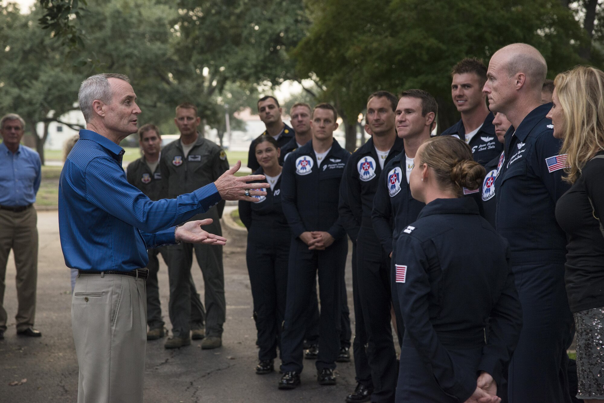 Lt. Gen. Darryl Roberson, commander of Air Education and Training Command, welcomes members of the U.S. Air Force Thunderbirds for a birthday celebration for retired Lt. Col. Richard Cole, Doolittle Raider, Oct. 30, 2015, at Joint Base San Antonio-Randolph, Texas.   The reception afforded General Roberson and attendees an opportunity to interact with an individual who represents a linkage to Air Force heritage. (U.S. Air Force photo by Airman 1st Class Stormy Archer/Released)