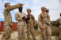 Marines with Headquarters and Service Company, 1st Battalion, 5th Marine Regiment, 1st Marine Division, spot a possible improvised explosive device during searchers and site exploitation training aboard Marine Corps Base Camp Pendleton, Calif., Oct. 27-29, 2015. The three-day training period provided 1/5 personnel with instruction on how to identify threats within a designated area and conduct systematic searches using appropriate detection equipment. (U.S. Marine Corps photo by Cpl. Demetrius Morgan/RELEASED)