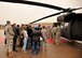 Students from the University of North Dakota Army Reserve Officer Training Course are briefed on safety on board a UH-60 Black Hawk helicopter on Oct. 31, 2015, on Grand Forks Air Force Base, North Dakota. Approximately 60 students attended static load training to learn how to enter and exit the helicopter properly. (U.S. Air Force photo by Senior Airman Xavier Navarro/Released)