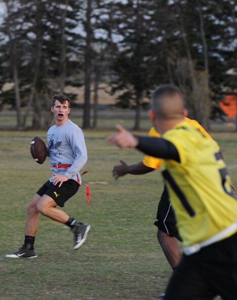 The 91st Missile Security Forces Squadron team recently won the Minot AFB Flag Football Championship, Oct. 19, 2015 at Minot Air Force Base, N.D. The team cruised through the championship game with a 56-18 win over the 705th Munitions Squadron team. The flag football program has been going on at Minot AFB for years as a way to build morale and for Airmen to come together and learn how to work together as a team, on and off the field. Win or lose the flag football program is all in good fun and faith. (U.S. Air Force photos/Senior Airman Kristoffer Kaubisch)