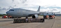 U.S. Air Force, Spanish and German air force members pose for a photo in front of a German air force Airbus A-310 Multi Role Tanker Transport Oct. 27, 2015, at Son San Juan Air Base, Spain. All three nations worked closely together for Exercise Trident Juncture 2015. (U.S. Air Force photo by Senior Airman Christine Halan/Released)