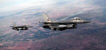 Portuguese air force F-16s fly over southern Spain, Oct. 23, 2015 as part of Exercise Trident Juncture 2015. Trident Juncture is one of many NATO exercises that provide a venue for current and, potentially, future NATO members to work on war fighting, communication and coordination skills. (U.S. Air Force photo by Senior Airman Christine Halan/Released)