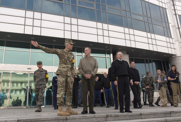 U.S. Marine Corps Gen. Joseph F. Dunford Jr., chairman of the Joint Chiefs of Staff, receives a briefing from U.S. Army Col. James Minnich, secretary of the U.N. Command Military Armistice Commission, during his visit to the Demilitarized Zone in South Korea, Nov. 2, 2015. DoD photo by U.S. Navy Petty Officer 2nd Class Dominique A. Pineiro