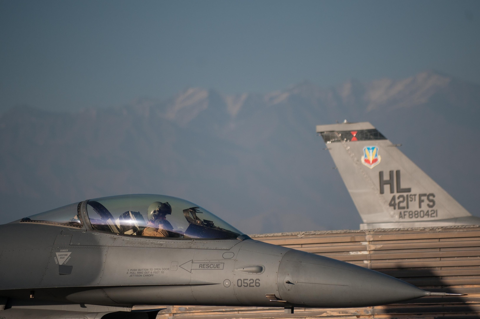 Lt. Col. Michael Meyer, 421st Expeditionary Fighter Squadron commander, deployed from Hill Air Force Base, Utah, performs pre-flight checks on an F-16 Fighting Falcon at Bagram Airfield, Afghanistan, Oct. 30, 2015. Airmen assigned to the 421st FS, known as the “Black Widows,” arrived here Oct. 28, 2015 in support of Operation Freedom’s Sentinel and NATO’s Resolute Support mission. (U.S. Air Force photo by Tech. Sgt. Joseph Swafford/Released)