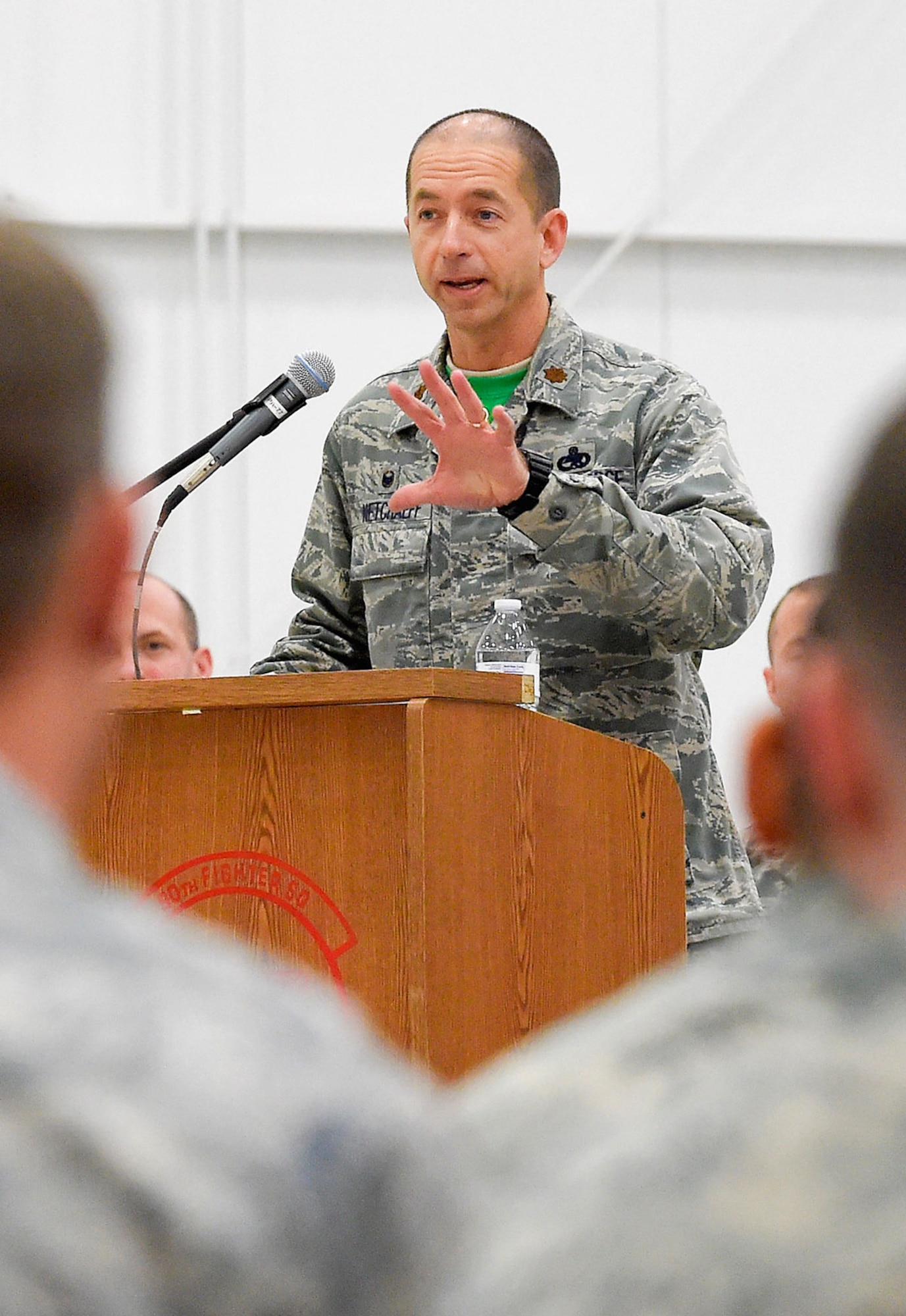 Air Force Maj. Paul Netchaeff, commander of the 3rd Aircraft Maintenance Squadron, speaks at a ceremony recognizing Dedicated Crew Chiefs Oct. 23. (U.S. Air Force photo/Alejandro Pena)